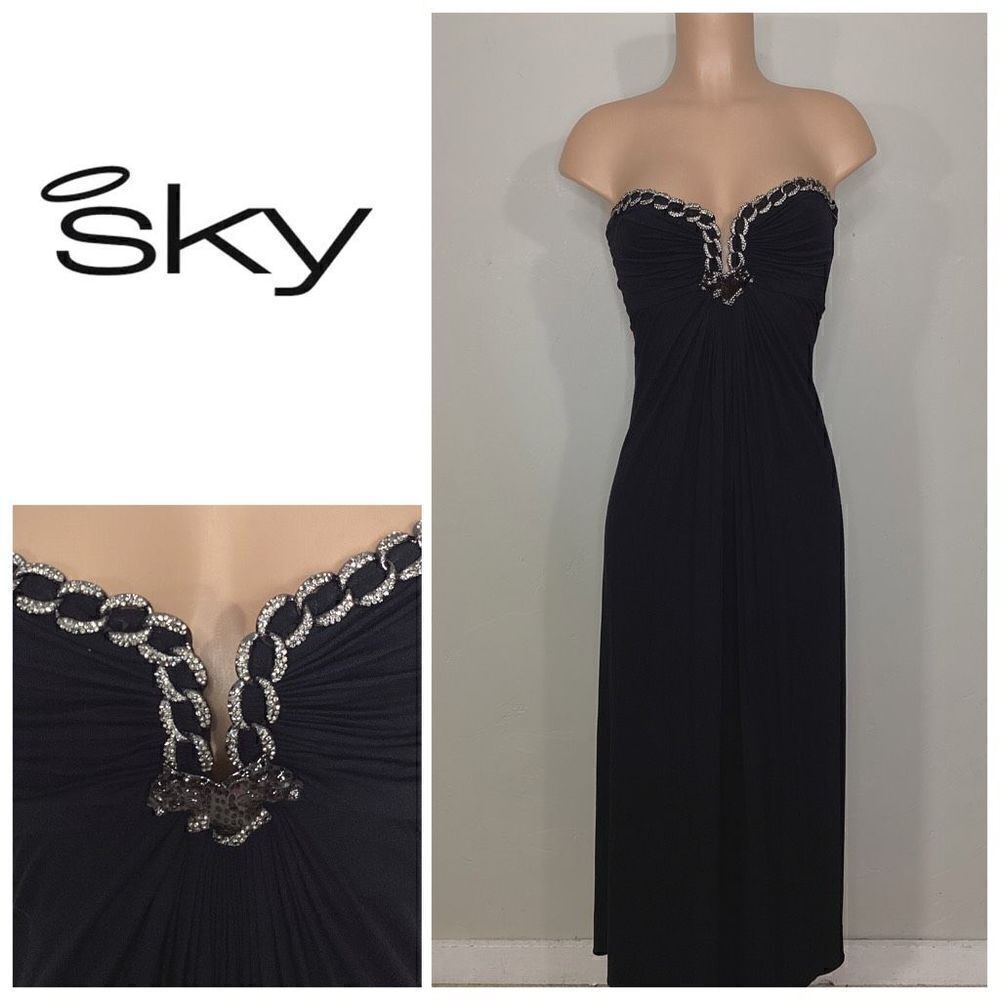 New. Sky black maxi dress with diamond cougar embellishments. XS. Retails $298
